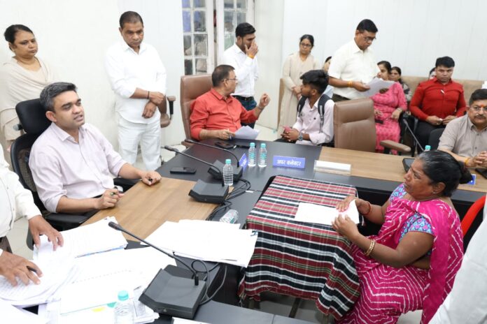 Collector Priyank Mishra listens to public grievances during the weekly Jan Sunwai in Bhopal on Tuesday.