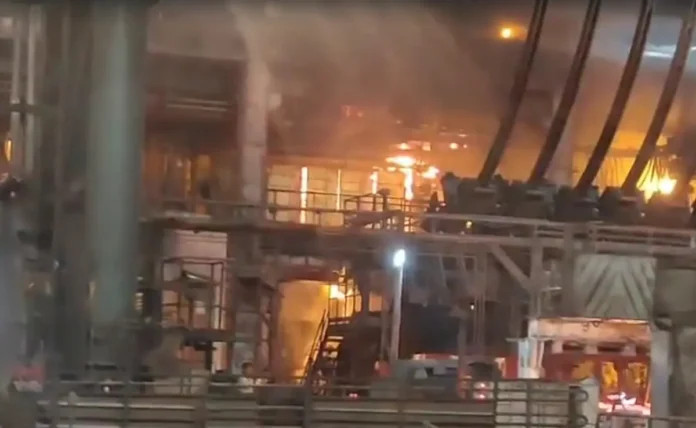 Emergency teams respond after a molten iron spill at Visakhapatnam Steel Plant in Andhra Pradesh.
