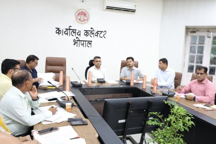 Bhopal Collector Priyank Mishra chairs a revenue department review meeting, directing officers to begin weekly Friday village visits from August 7.