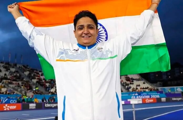 Sharmila Dhankhar celebrates after winning gold in the women's para shot put F57 event at the Commonwealth Games.